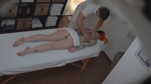 4. Download full pics of Tattooed Redhead Gets Fucked Hard by Her Masseur from czechmassage.com