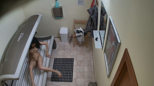 3. Download full pics of Brunette Peeling Off for a Free Pussy Show from czechsolarium.com