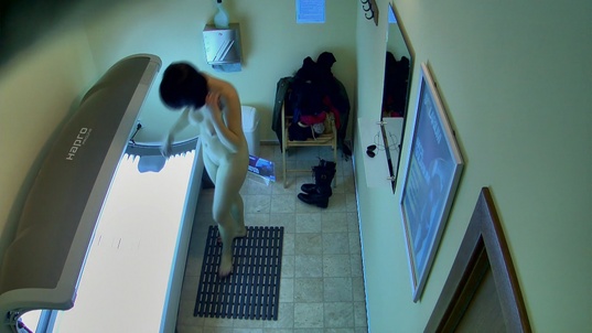 3. Download full pics of Brunette Starts Playing With Her Pussy in Solarium from czechsolarium.com