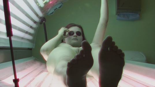 4. Download full pics of Brunette Sunbathes and Exposes Her Tight Pussy from czechsolarium.com