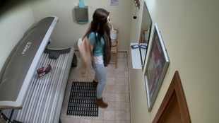 1. Download full pics of Young Brunette Exposes Everything in Solarium from czechsolarium.com