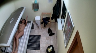 3. Download full pics of Tanned Chick Strips Down for the Cameras from czechsolarium.com