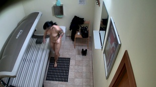 3. Download full pics of Tattooed Brunette Strips Down for a Tan from czechsolarium.com