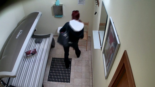 1. Download full pics of Blonde Teases Cameras in Solarium from czechsolarium.com