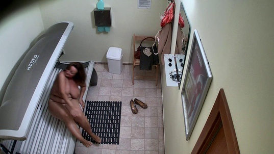 3. Download full pics of Husky Housewife Rocks the Solarium from czechsolarium.com