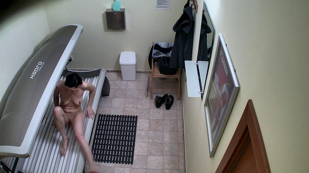 Slim MILF's Tempting Solarium Session