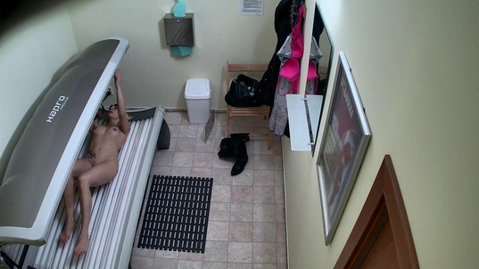 3. Download full pics of Blonde MILF’s Seductive Solarium Session from czechsolarium.com