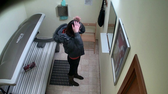 1. Download full pics of Brunette's Tan Lines Caught on Camera from czechsolarium.com