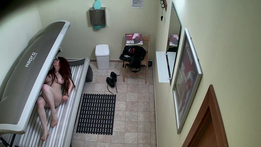 3. Download full pics of Busty Ginger's Tempting Solarium Session from czechsolarium.com