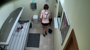 2. Download full pics of Tattooed Redhead Unwittingly Gets Filmed from czechsolarium.com