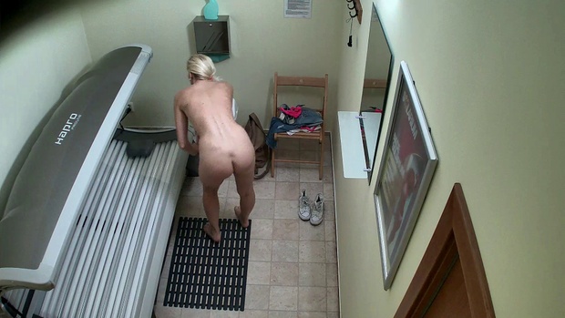 3. Download full pics of Busty MILF's Hidden Solarium Show from czechsolarium.com