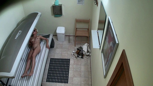 3. Download full pics of Blonde MILF Caught in the Act from czechsolarium.com