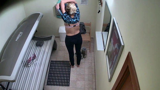 1. Download full pics of Naughty Brunette in Solarium—Caught from czechsolarium.com