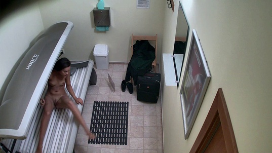 3. Download full pics of Hot Brunette Caught in Solarium from czechsolarium.com