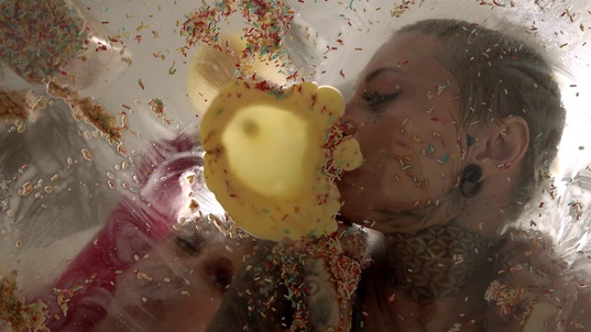 4. Download full pics of Sash Beart Pukes on Glass Table from powerfetish.com