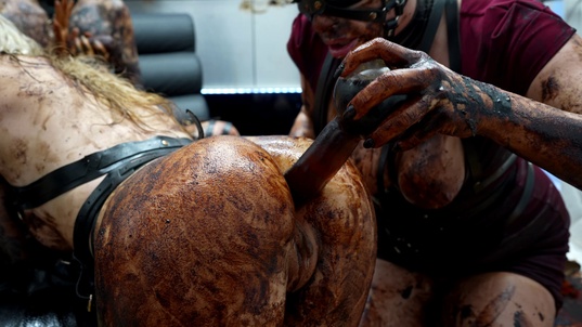 2. Download full pics of Chocolate Anal Squirt from powerfetish.com