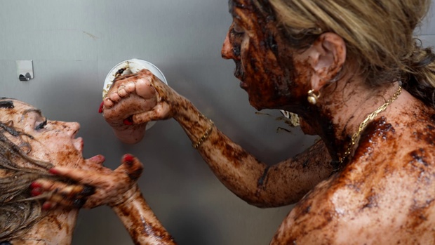 12. Download full pics of Rolling in Piss and Chocolate from powerfetish.com