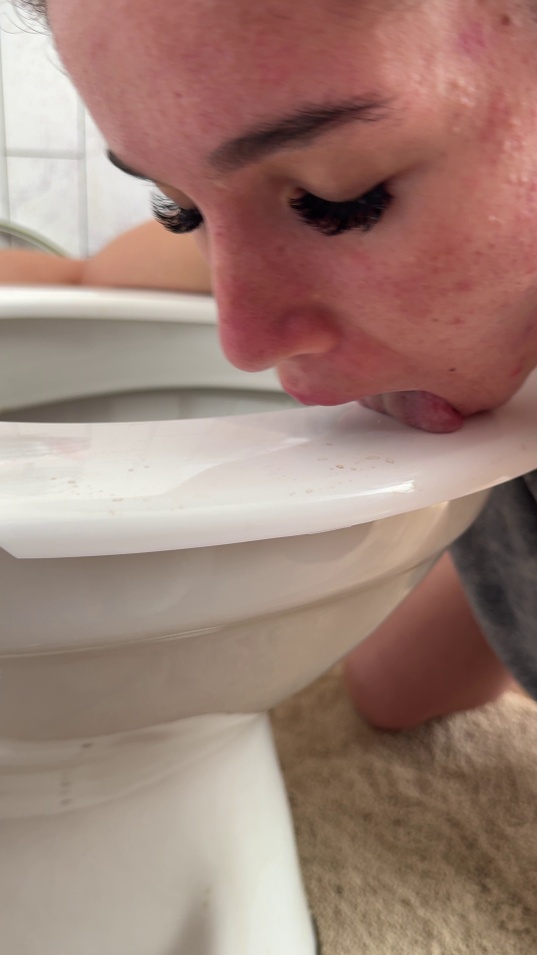 brunette,white skin,slim body,kneeling,bathroom,toilet,tongue out,licking toilet,face down,grey shirt,panties hiked,close up,selfie,oral fixation