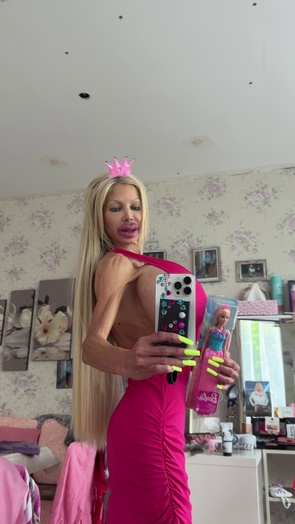 2. Download full pics of Pink Barbie dress, crown, and tits stealing the mirror 💗 from goperv.com