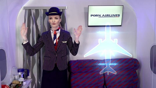 5. Download full pics of Stewardess: Mile High Club from nudz.com